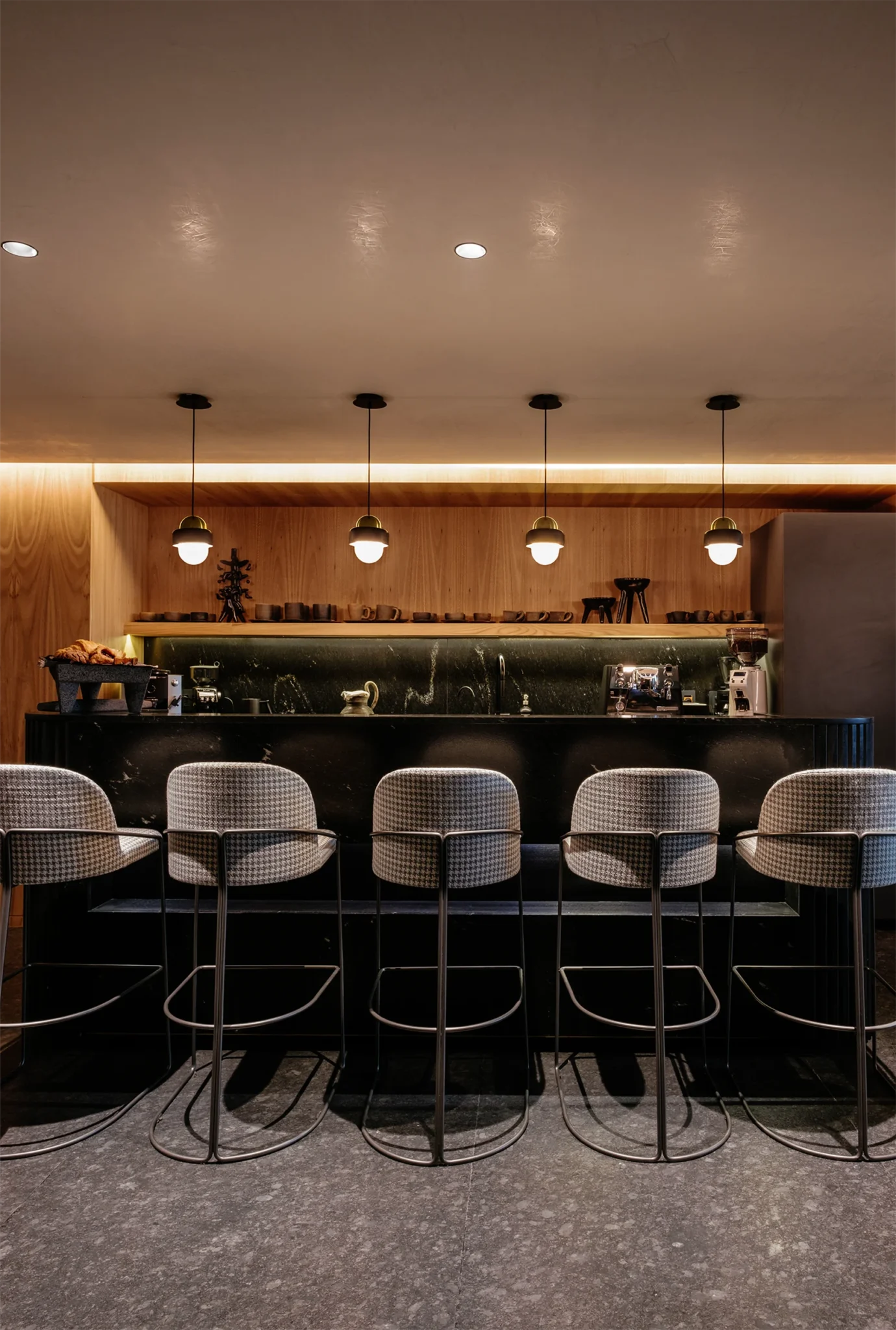 Pendant lamps for restaurants, bars or kitchens, made with black marble and brass.