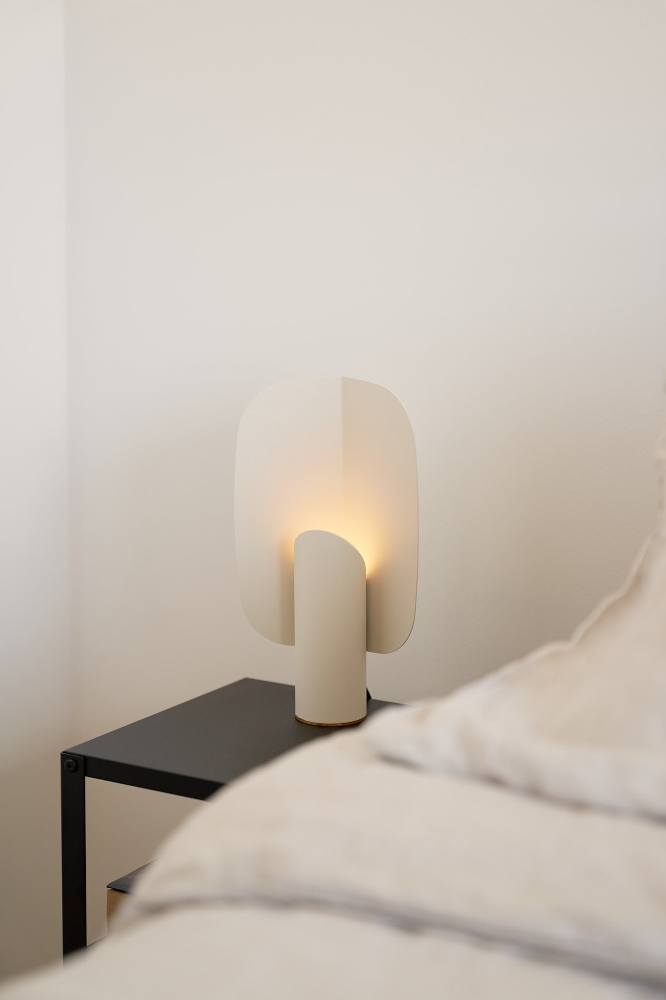 White metal table lamp designed by Bandido Studio