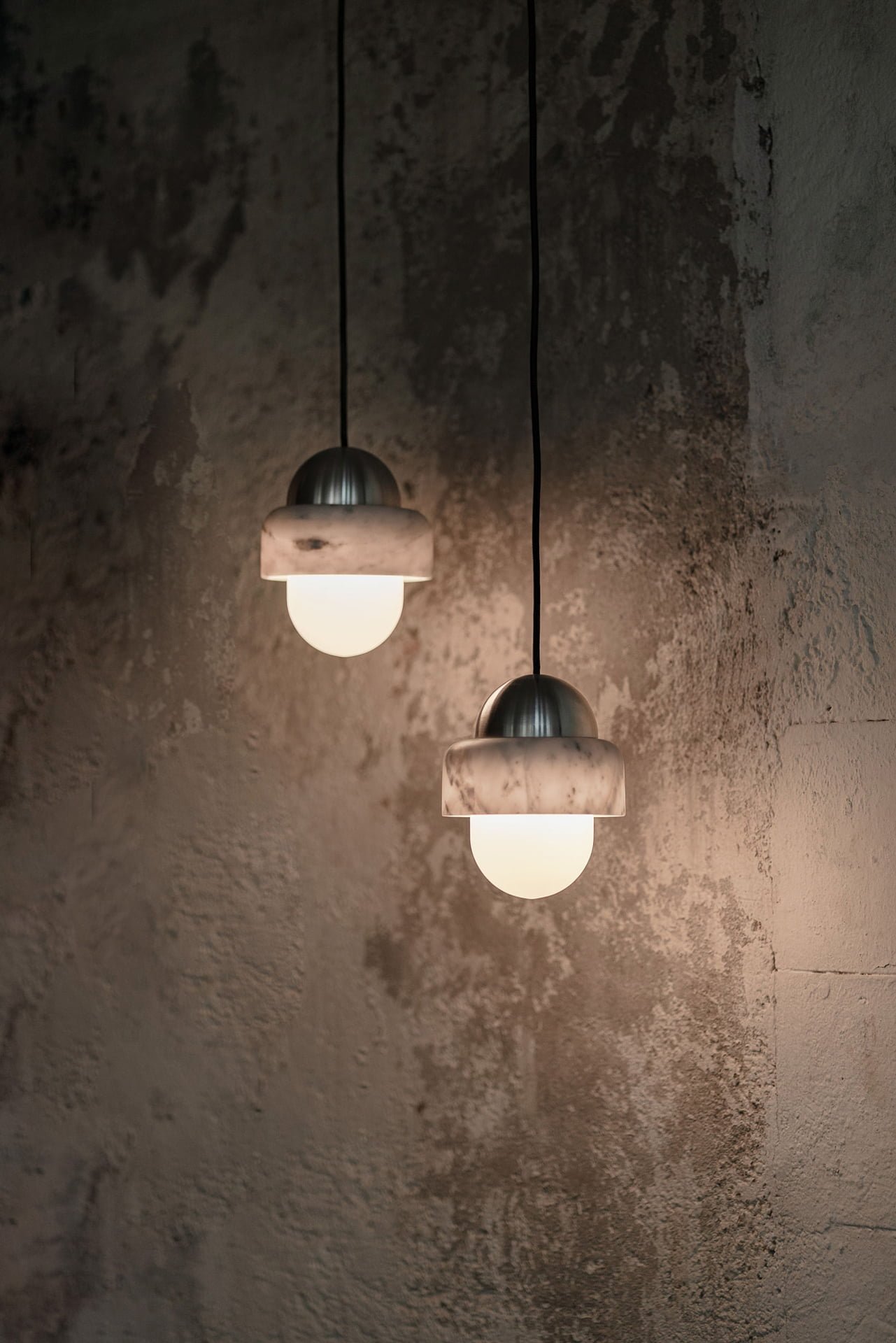 White marbel pendant lamps with warm light and