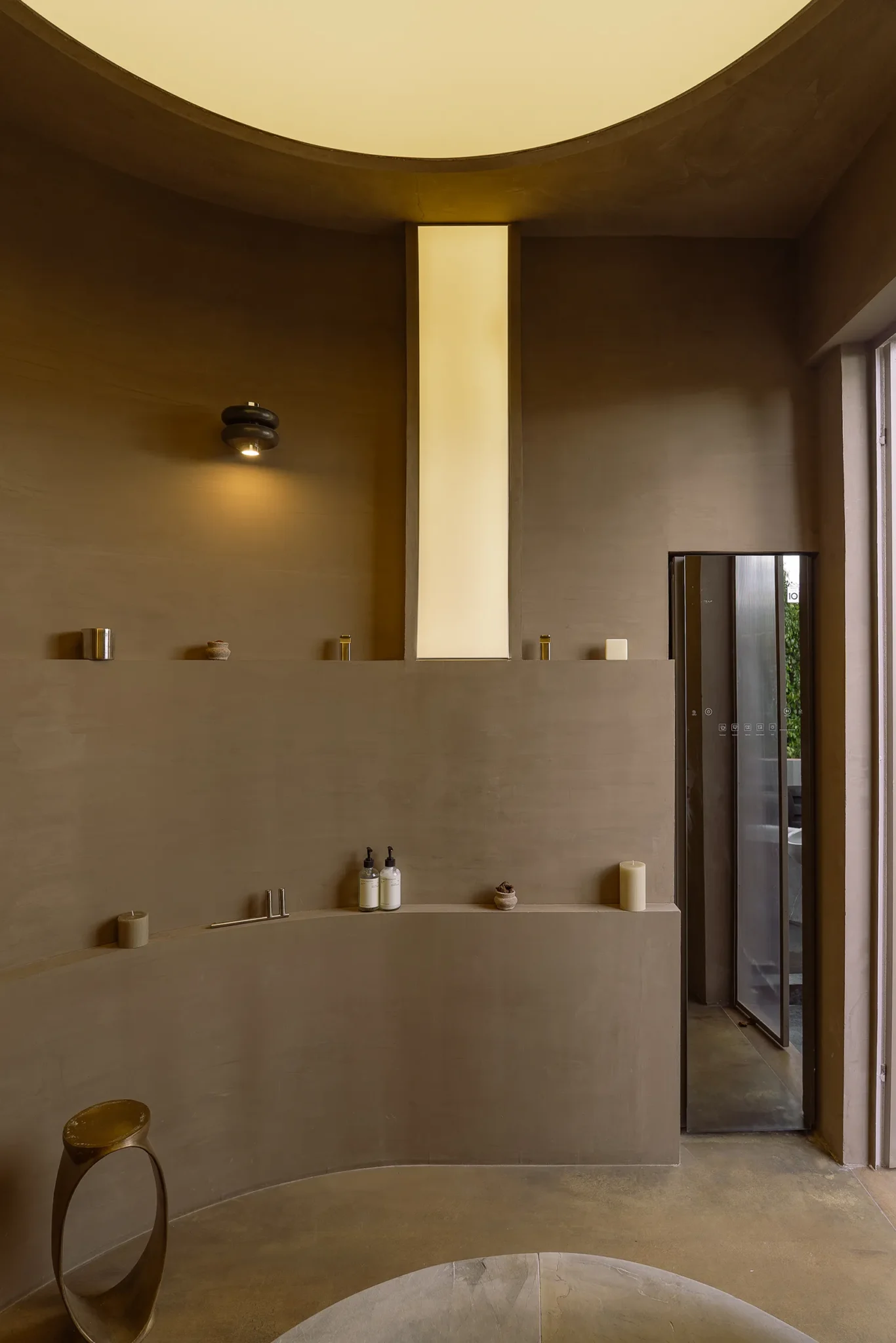 DUO wall light in Tikal green marble with chrome shaft, designed by Bandido at ITZCALI, a space designed by Sebastián Ángeles, Helvex & Herencia at DH 2025