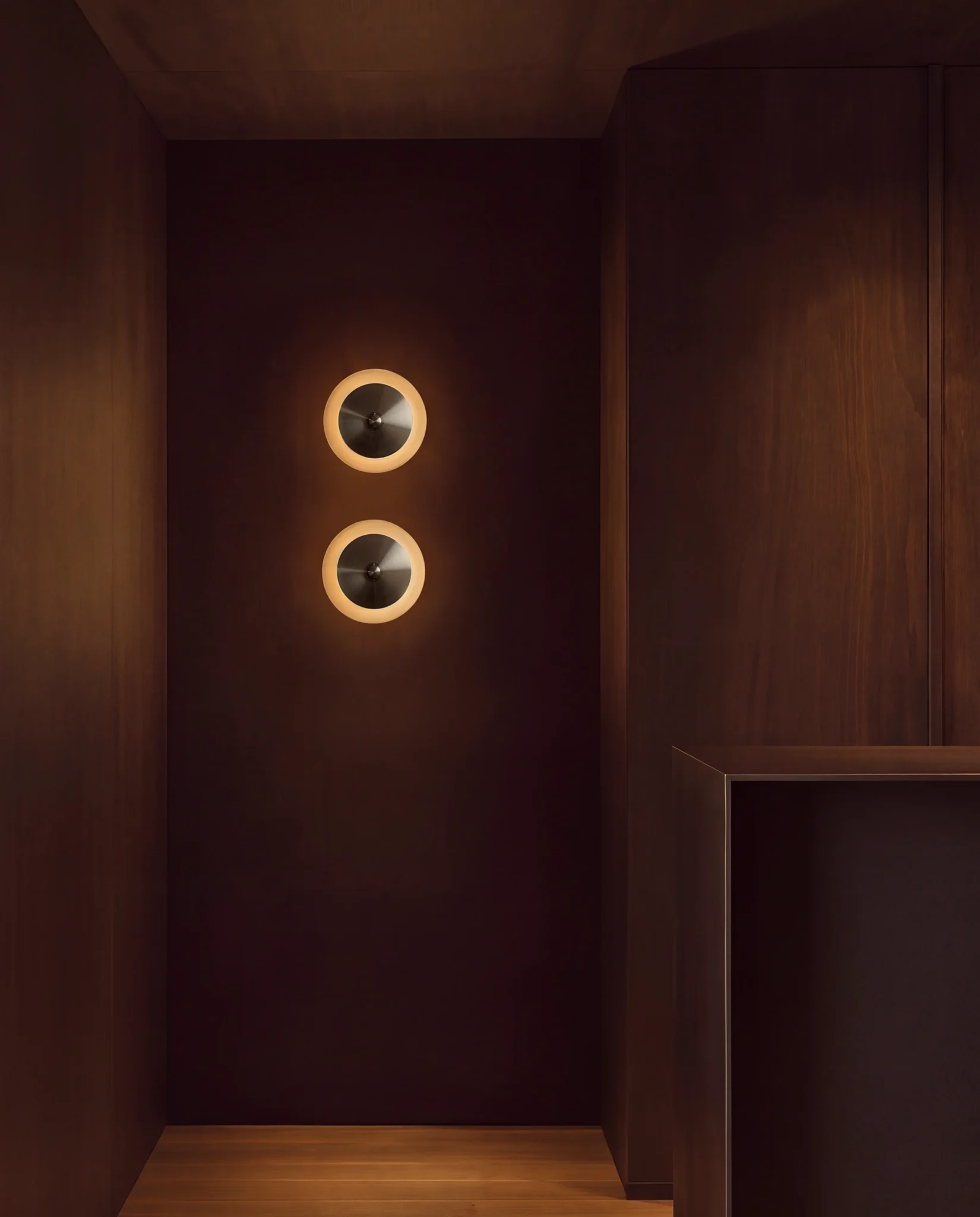Luminarias de pared FASE 25 acabado acero cepillado y plato de ónix, luz cálida diseño mexicano Bandido Studio