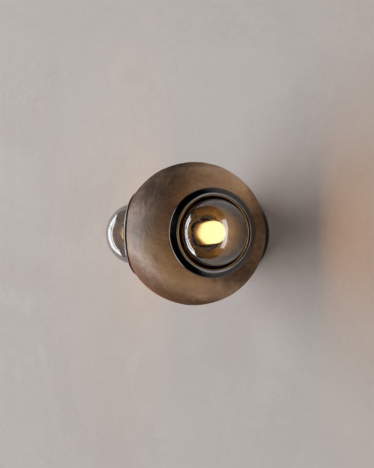 HUMO 18 wall lamp in mottled mud color with smoked glass diffusers and black anodized aluminum detail designed by Bandido Studio
