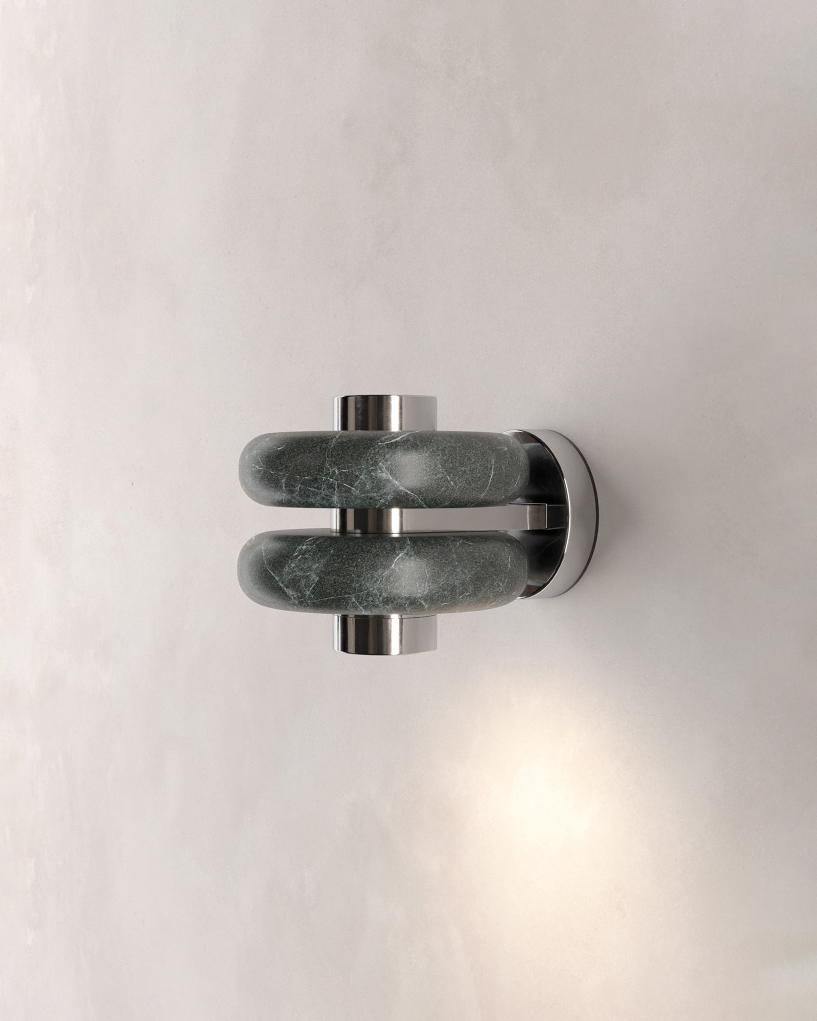 DUO wall luminaire made of verde tikal marble and chrome metal designed by Bandido Studio.