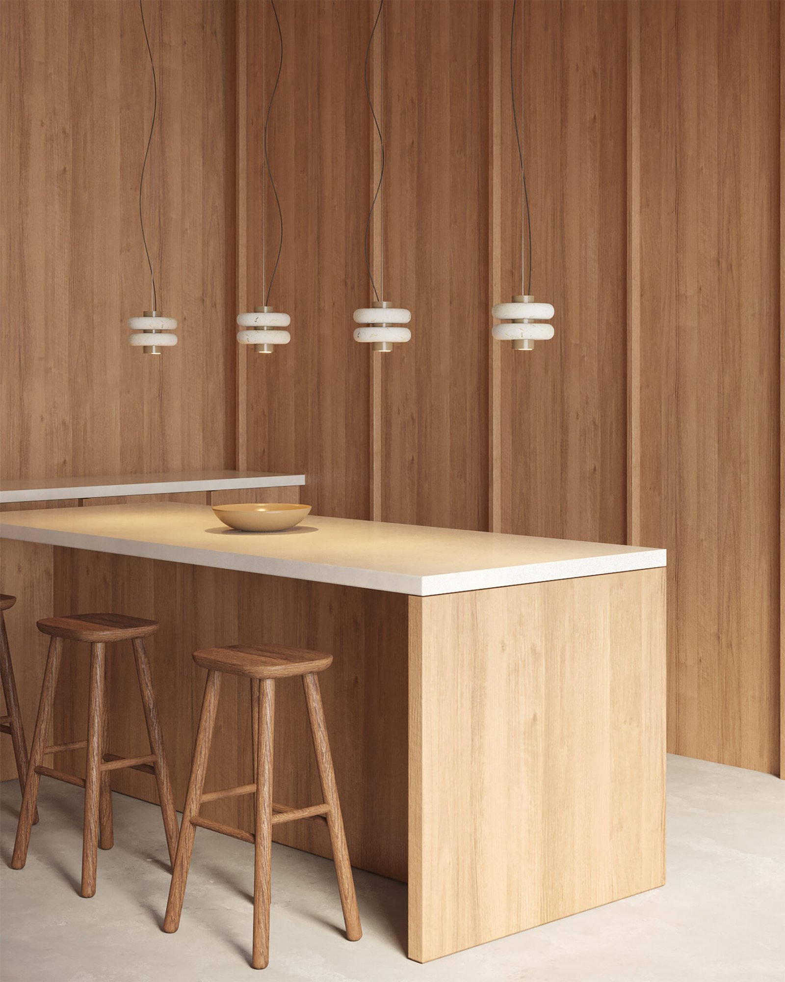 Set of DUO hanging lamps in beige Maya marble designed by bandido studio in kitchen-dining room.