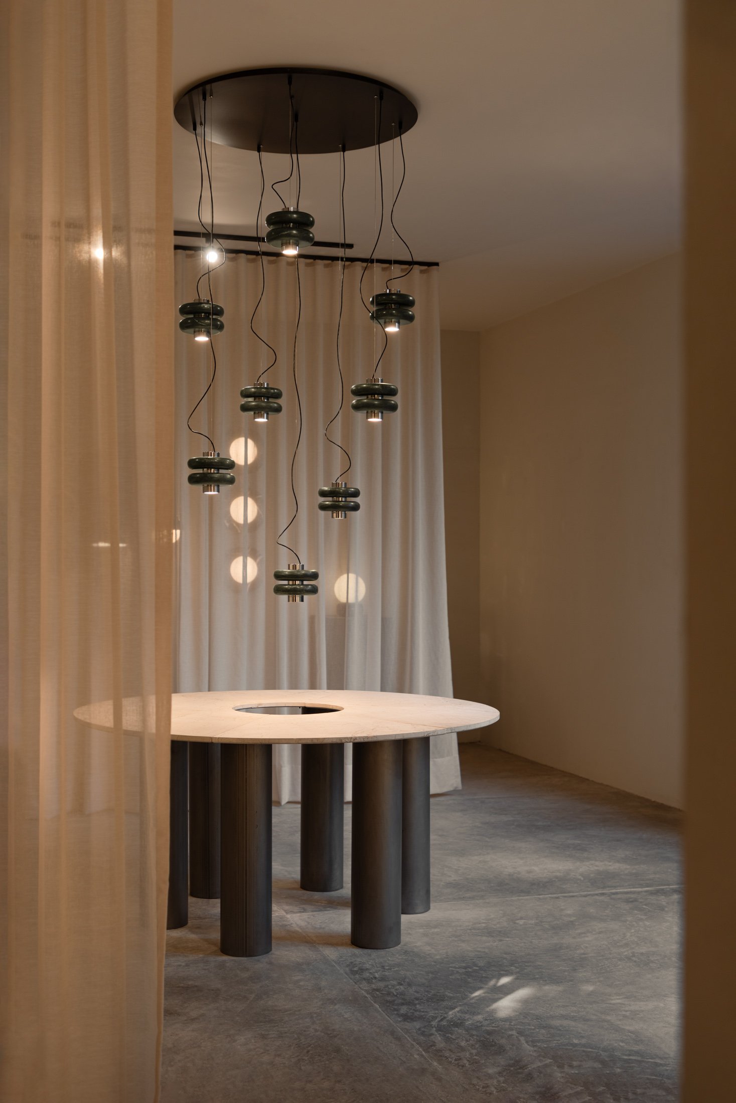 Set of DUO pendant lamps in green Tikal marble designed by Bandido Studio in Mexico, present in the new Polanco CDMX showroom.