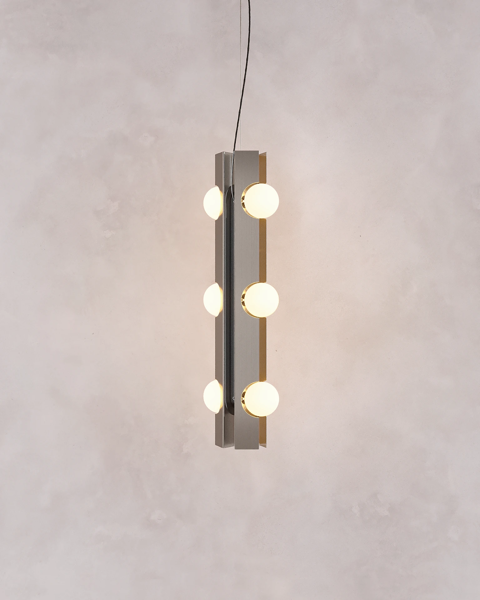 Capítulo NOVA | Lámpara FLUX colgante 70 vertical acero inoxidable y difusores de vidrio diseñada por Bandido Studio