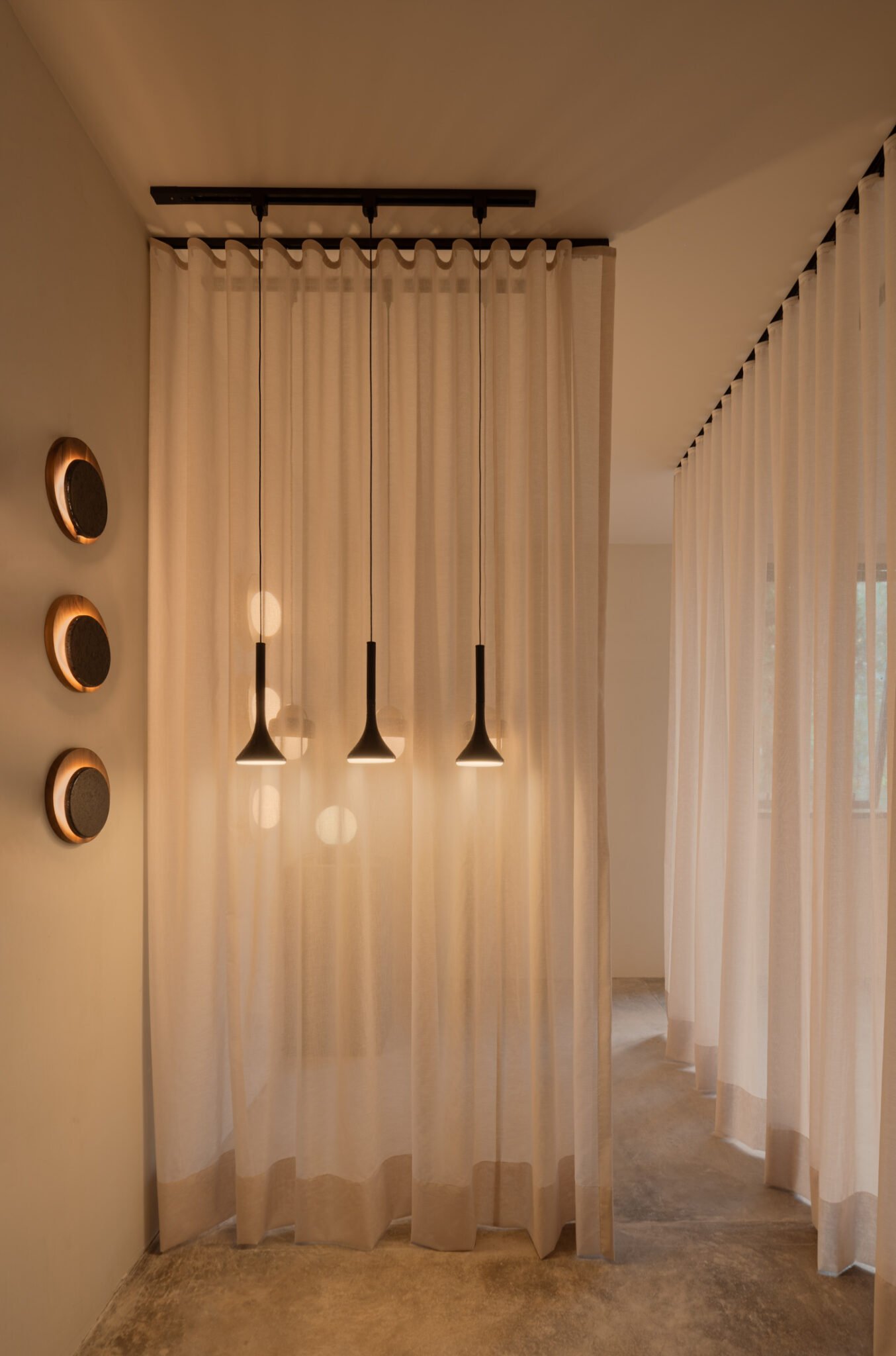 AURA lighting collection , made of porcelain-coated steel and wood, designed by Bandido, available at the Polanco showroom in Mexico City.