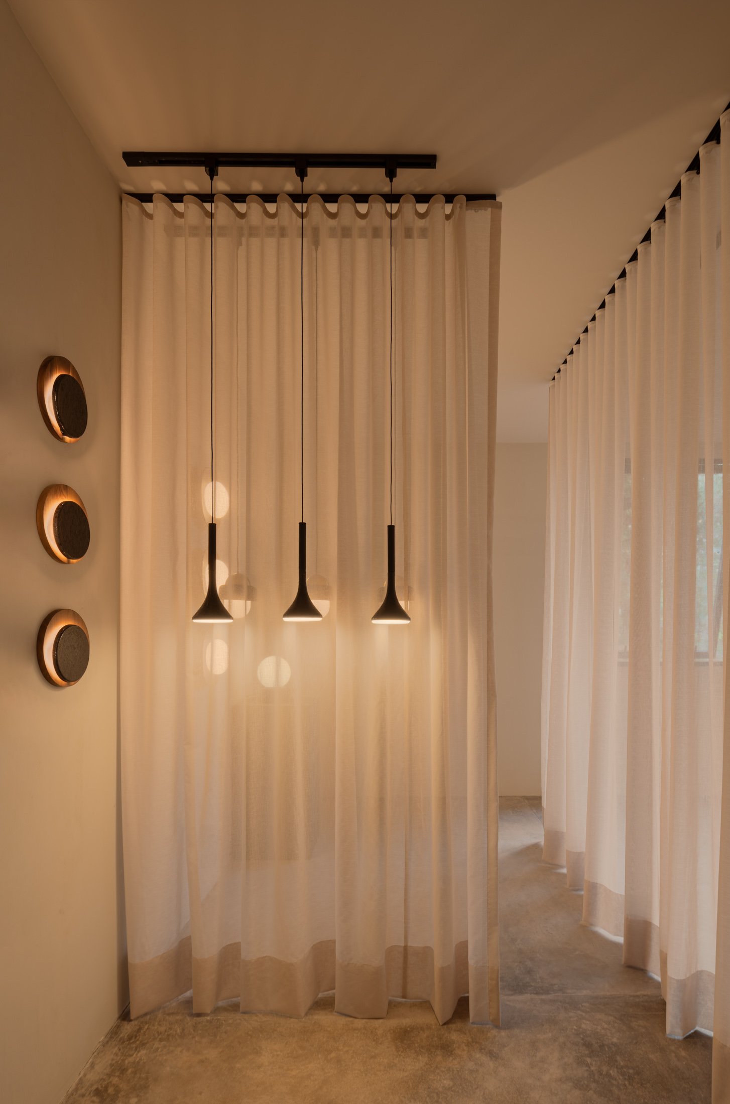 AURA lighting collection , made of porcelain-coated steel and wood, designed by Bandido, available at the Polanco showroom in Mexico City.